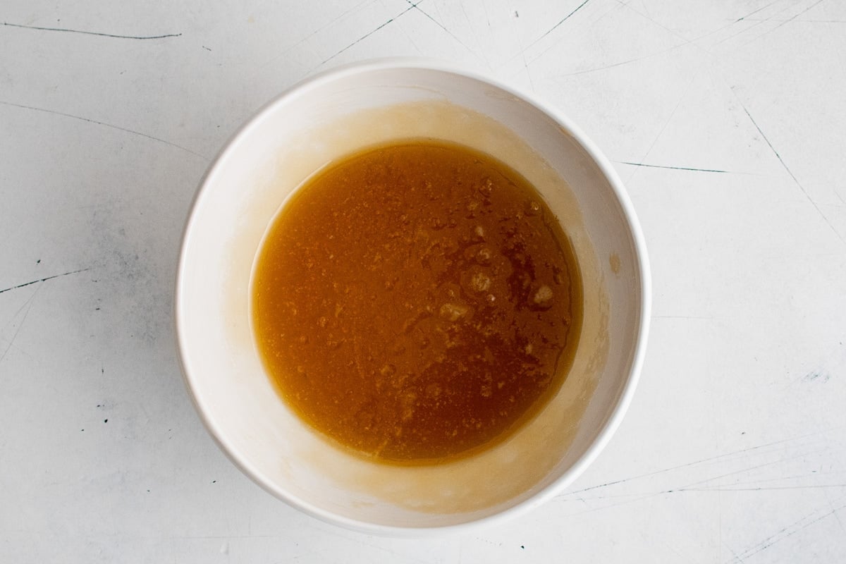 Honey, butter and brown sugar mixture in a bowl.