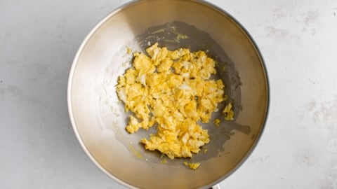 Scrambled eggs in a wok.