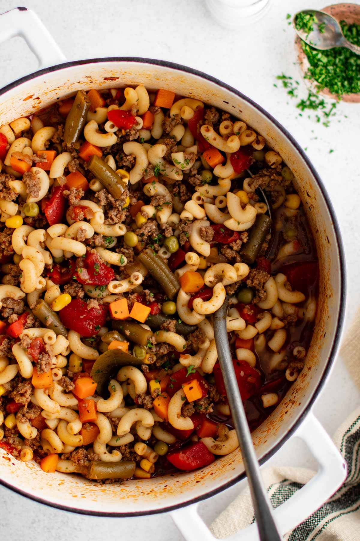 Soup with macaroni, ground beef, and veggies.