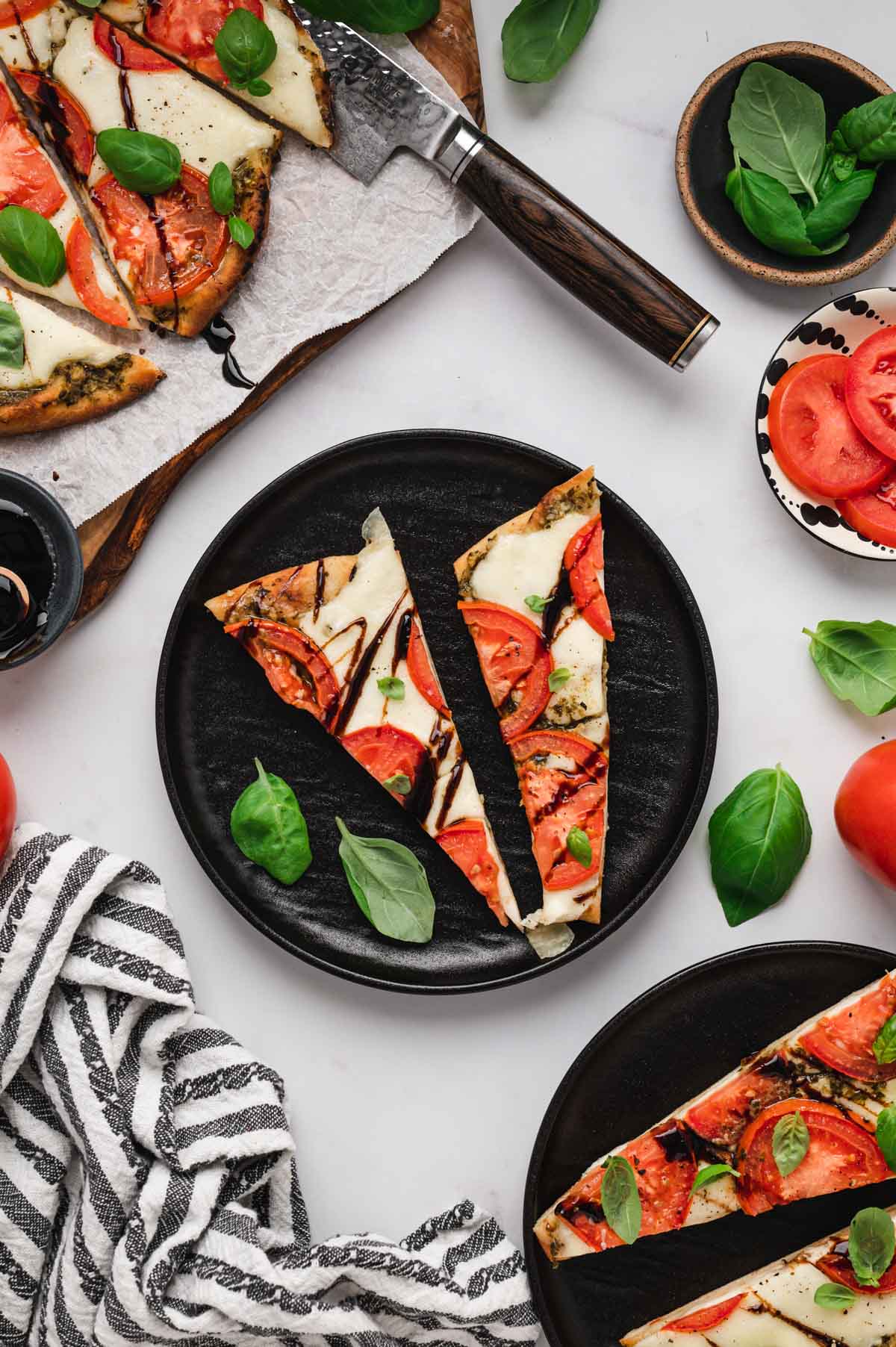 Slices of tomato and mozzarella flatbread