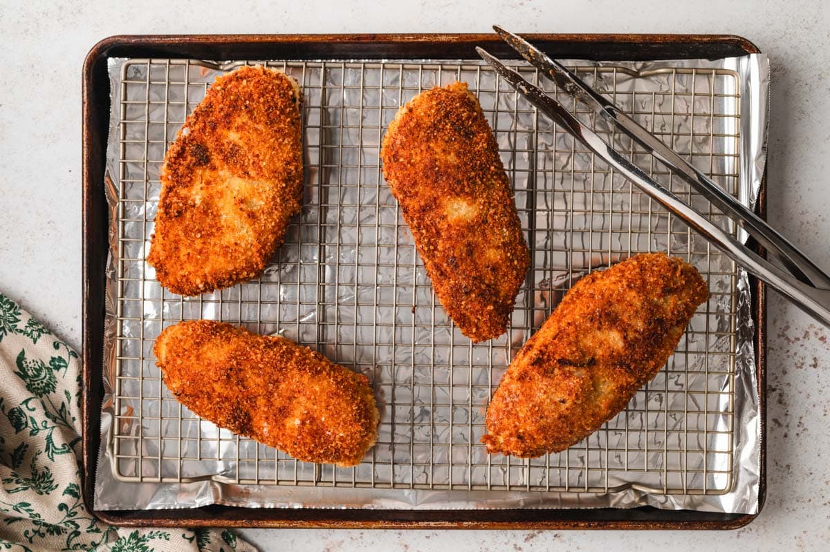 4 crispy fried chicken breasts.