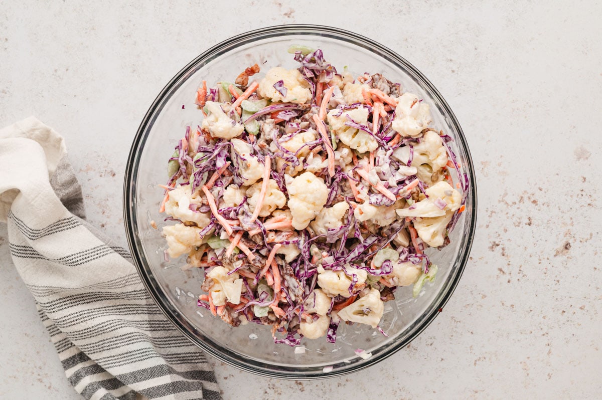 Caulfilower, red cabbage and bacon in a creamy dressing.