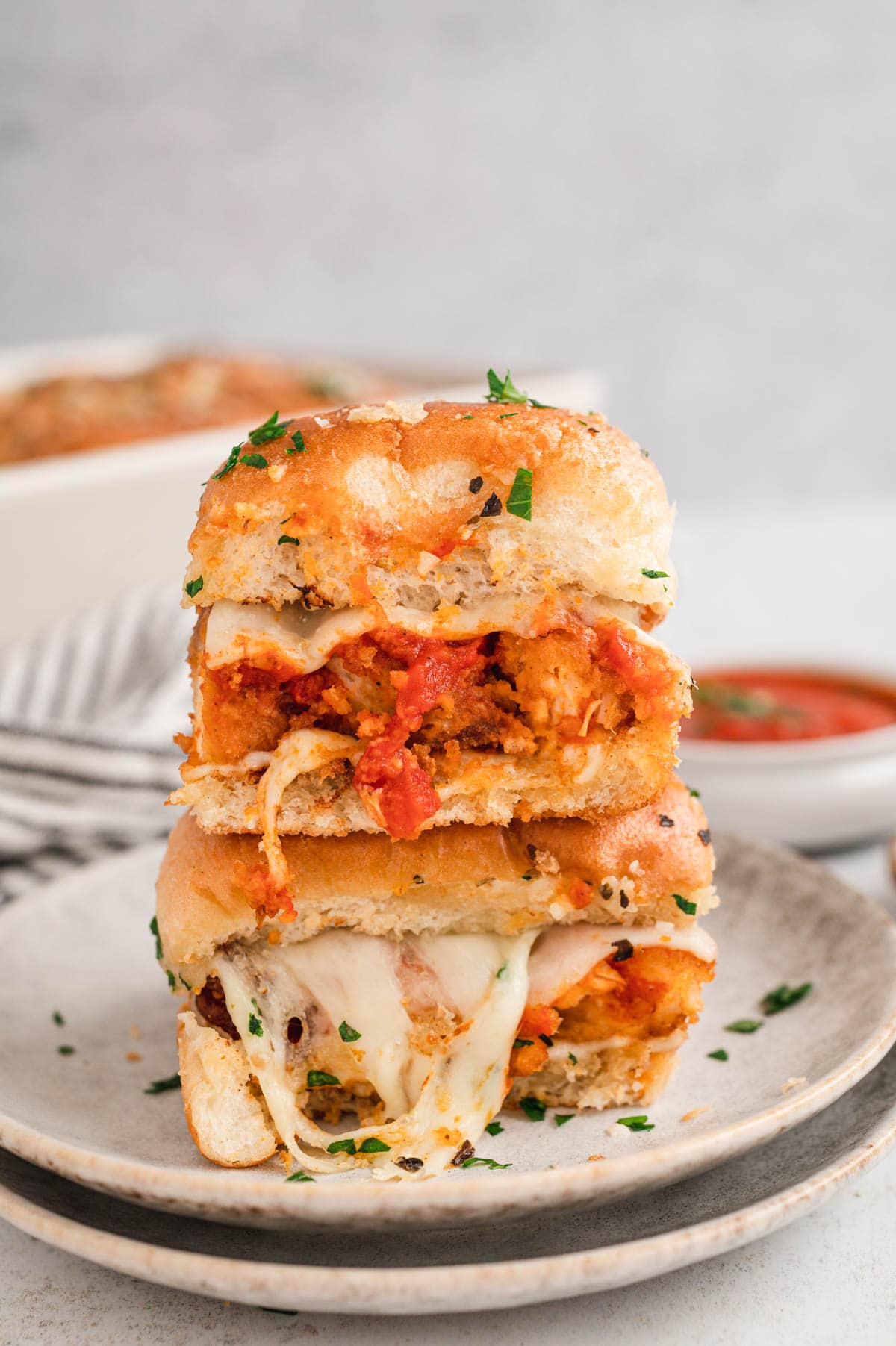 Stacked two chicken parmesan sliders