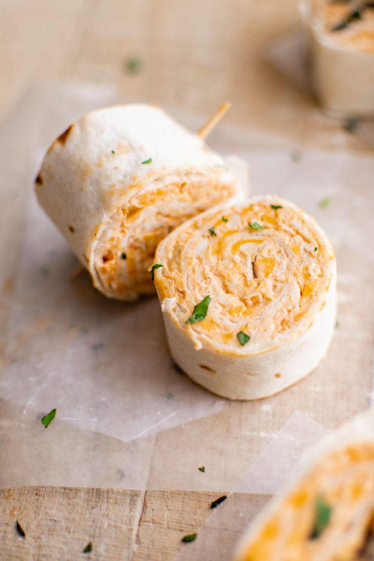 Two pieces of mexican tortilla roll up.