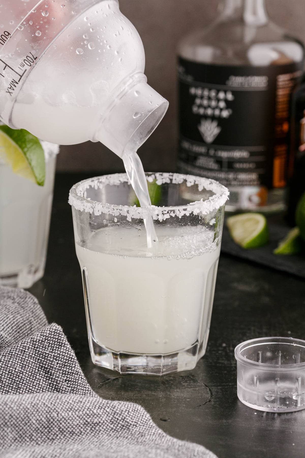 margarita being poured into a glass