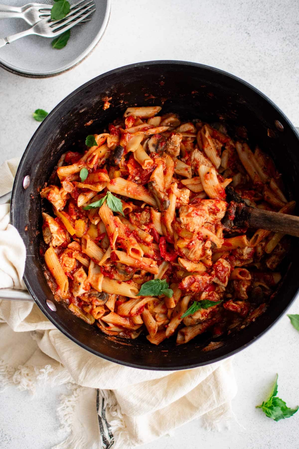 Chicken Cacciatore with pasta in a large pan.