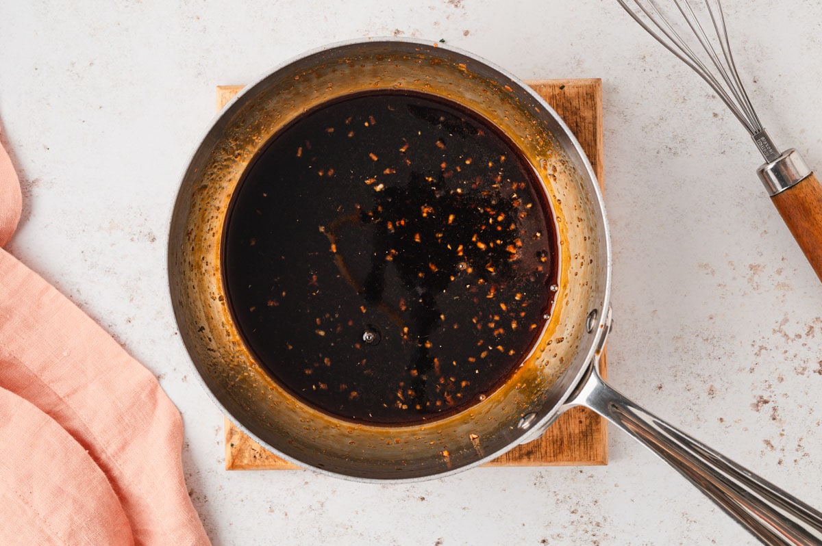 teriyaki sauce in a metal skillet.