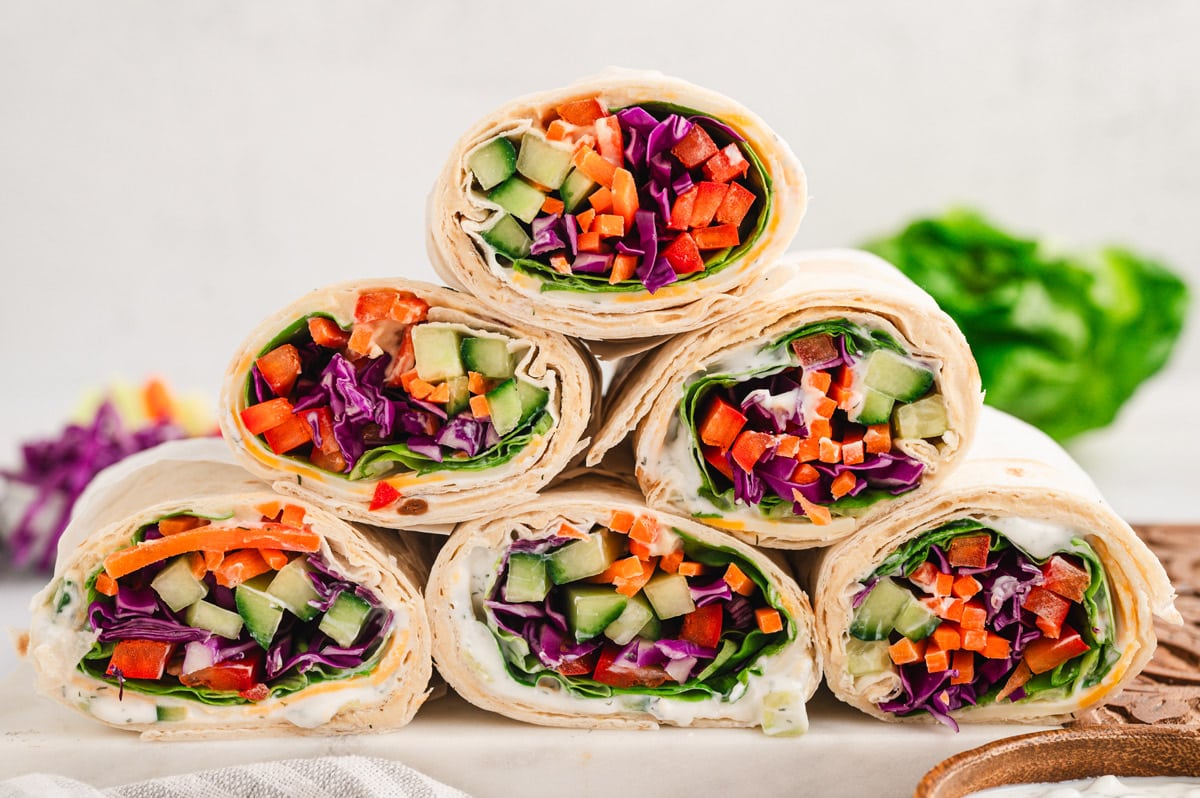 Pyramid made from rolled up tortilla veggie wraps.