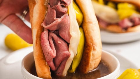 Italian beef sandwich dipped in au jus.