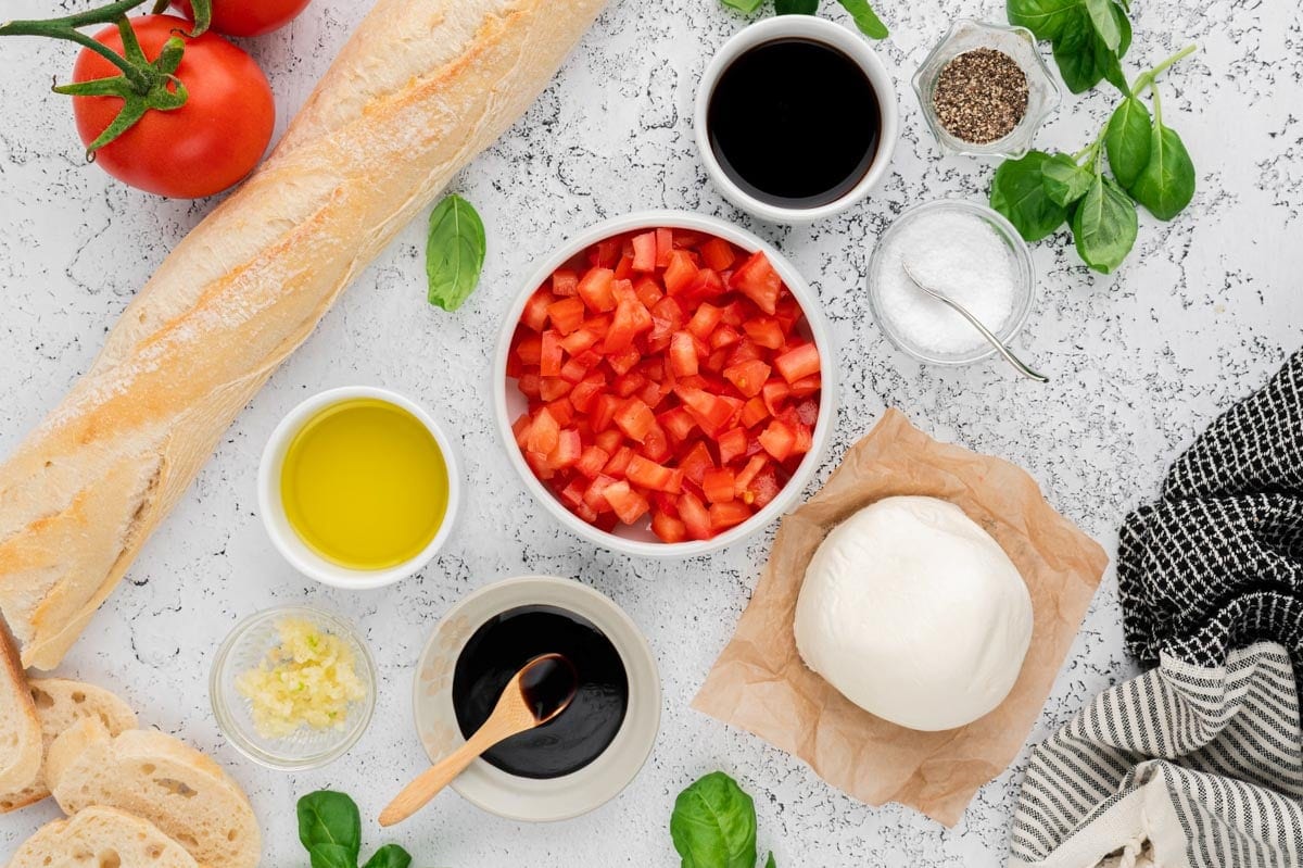 Ingredients needed to make mozzarella bruschetta.