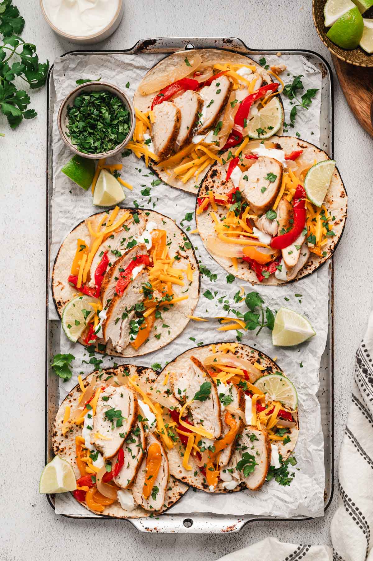 Flour tortilla, fajita chicken and peppers in a slow cooker