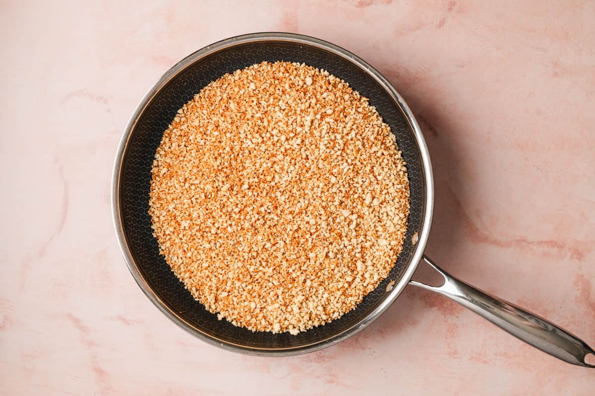 Panko breadcrumbs in a skillet.