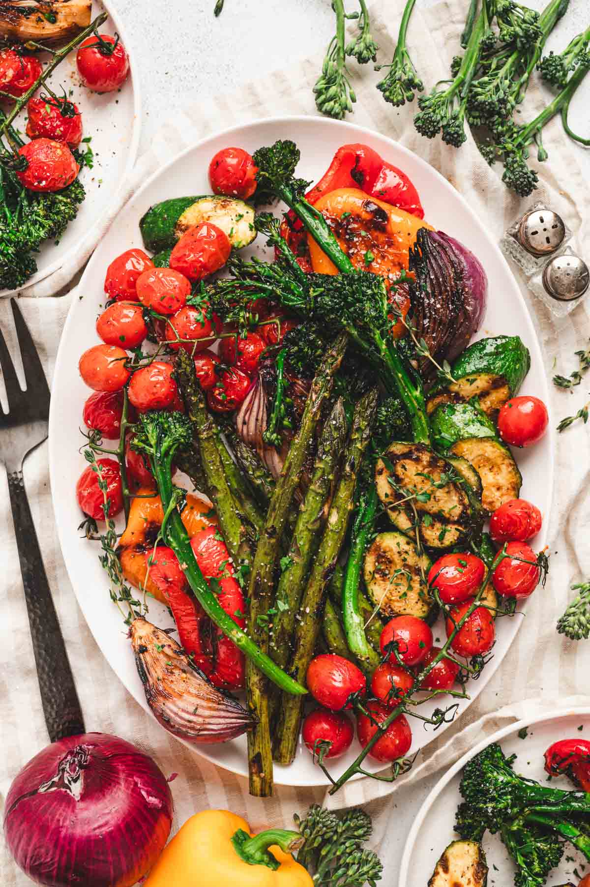 Grilled vegetables on a white plate.