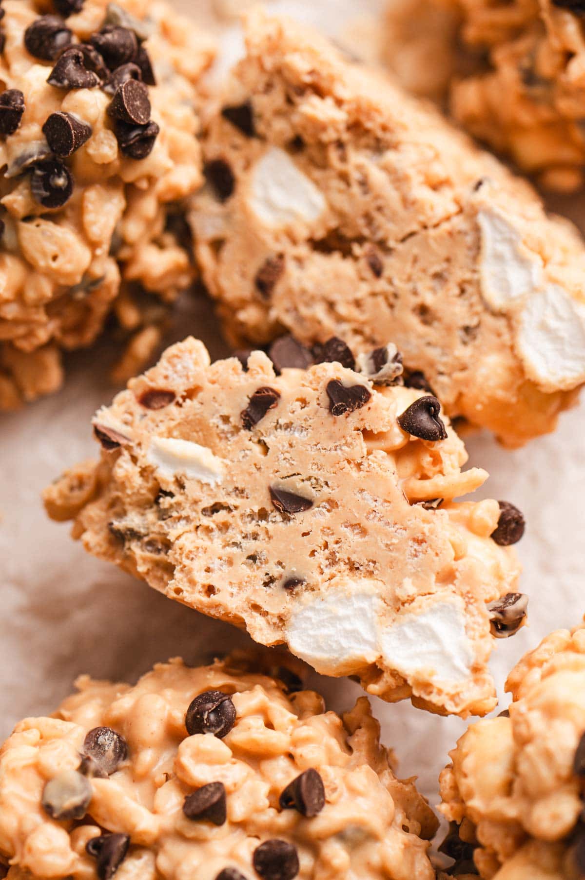 Avalanche cookies after being chilled and sliced in half, showing the texture chocolate chips, and marshmallows inside.