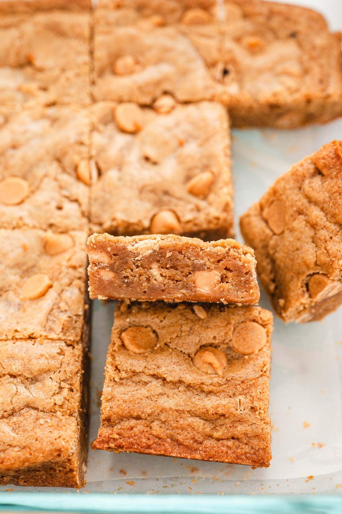 Close up of blondies with golden chips.