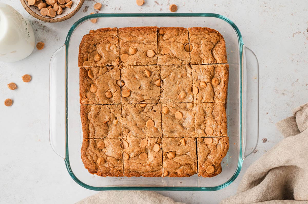 Baked blondies in a glass baking dish.