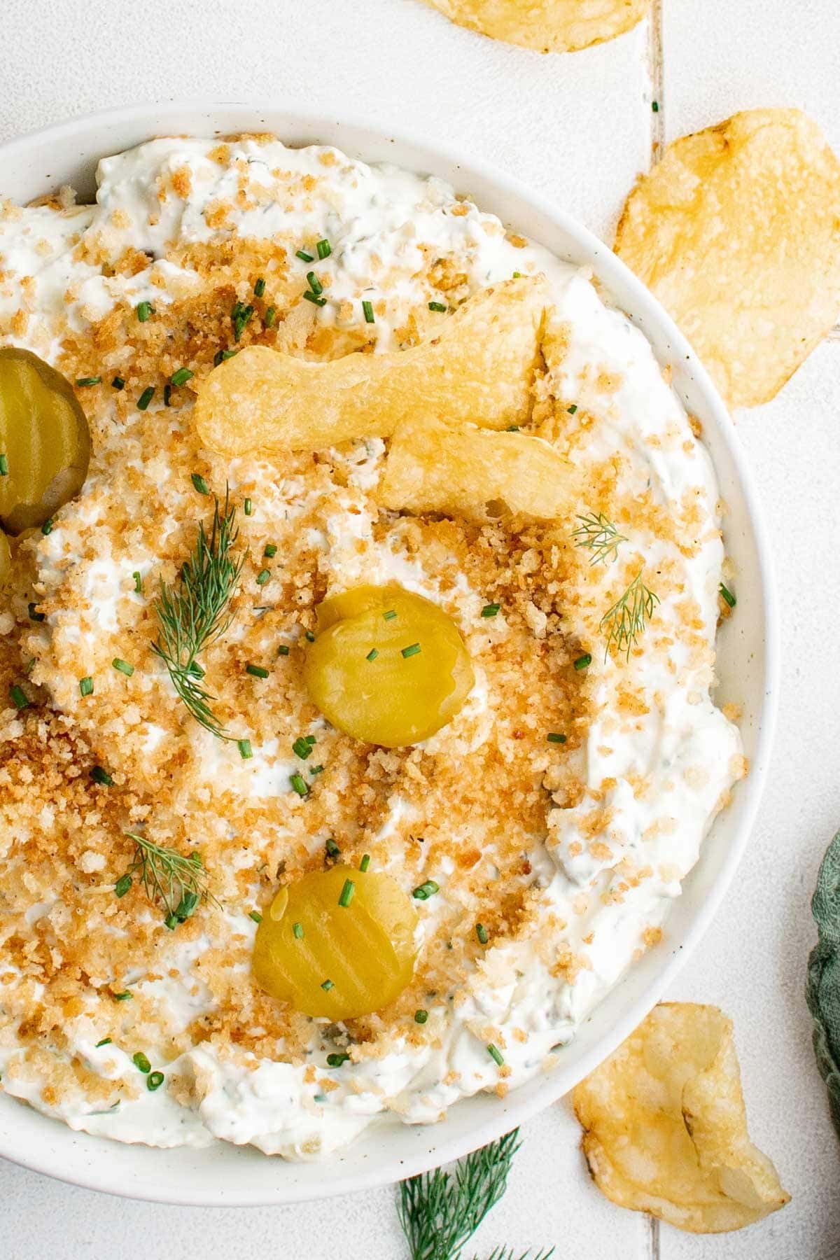 Ranch dip with dill pickles and panko topping. 
