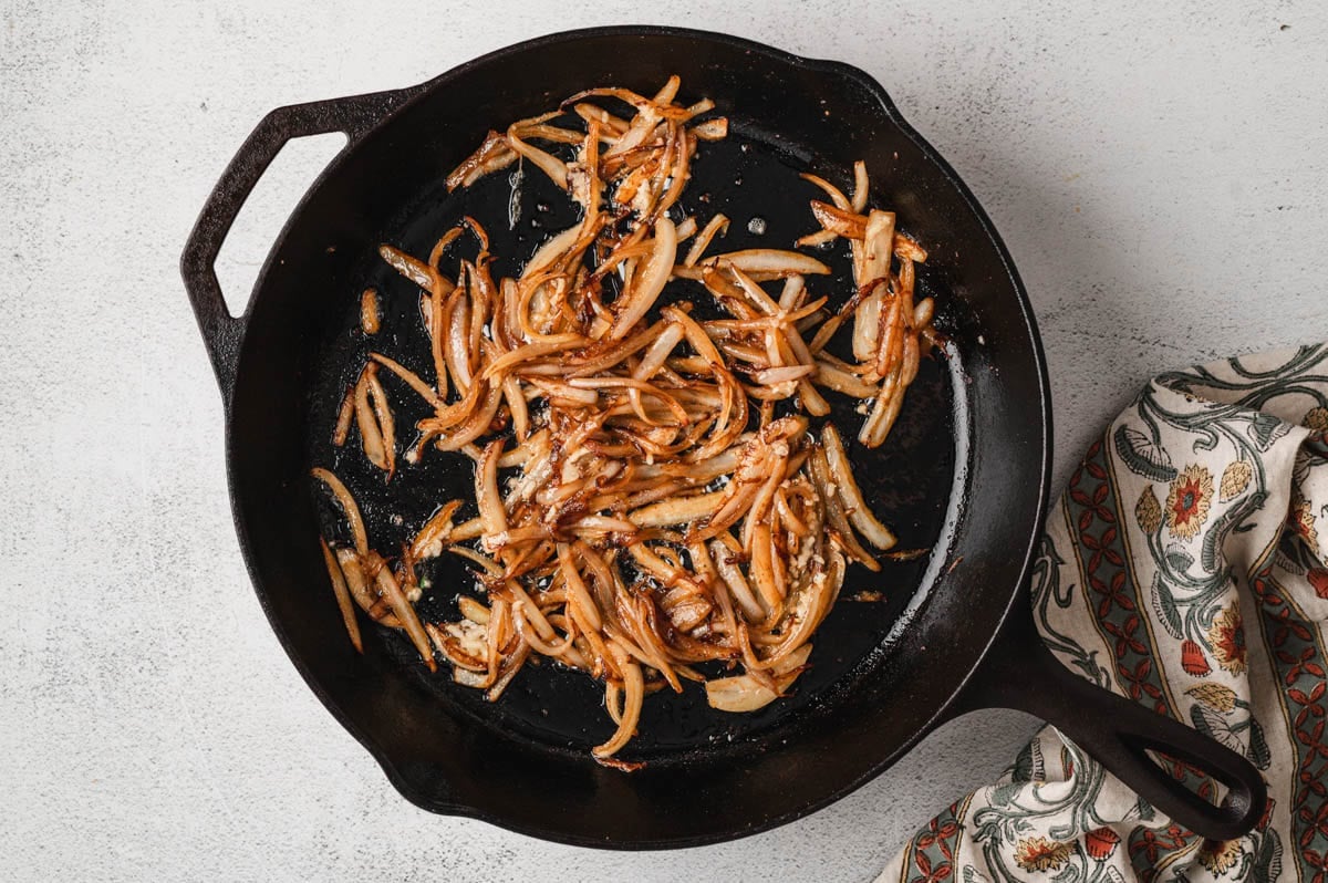 Onions after being caramelized in a cast iron skillet.