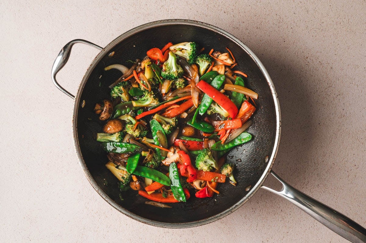 Vegetable stir fry after being cooked so the sauce thickens and coats the vegetables.