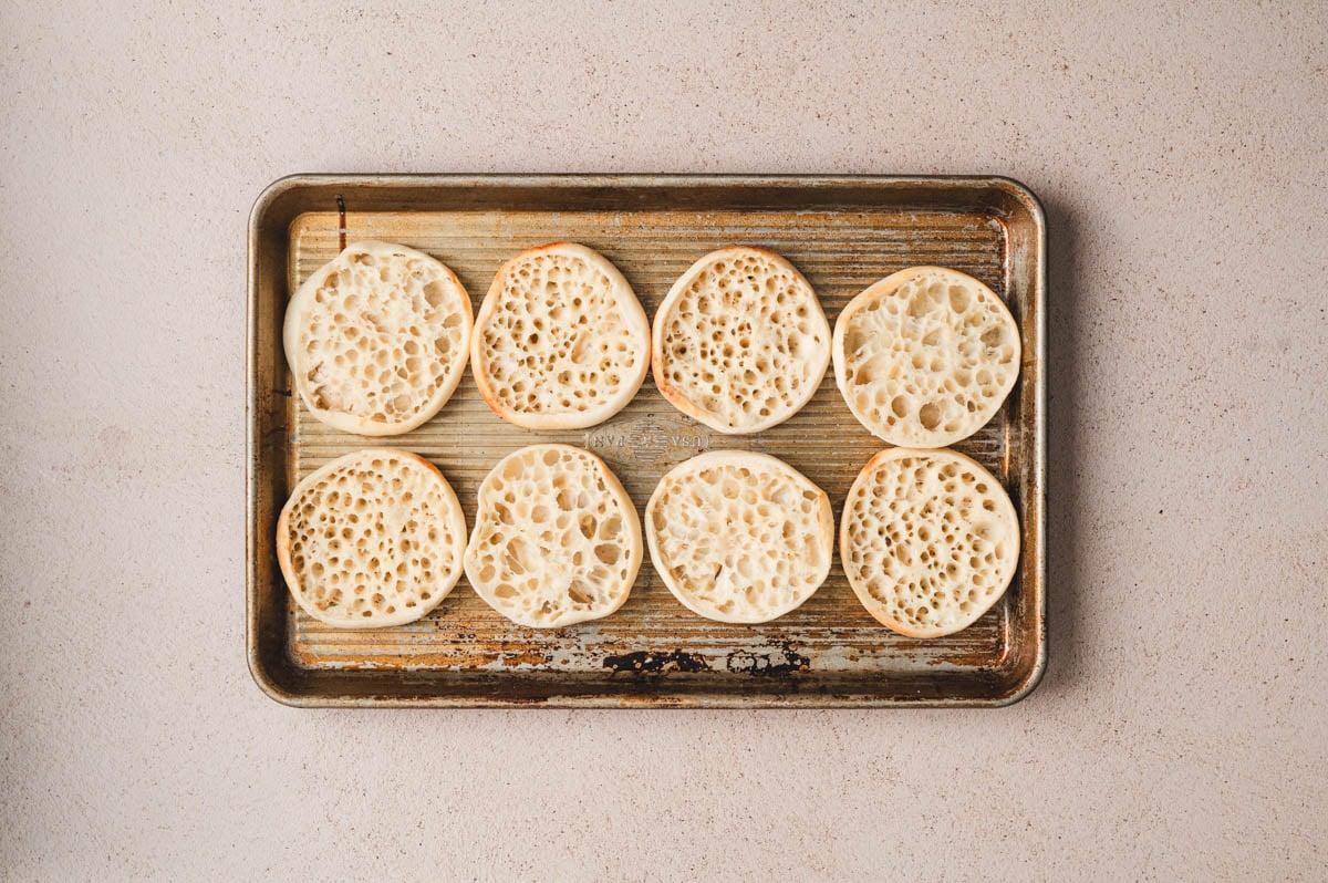 English muffins on a sheet pan.