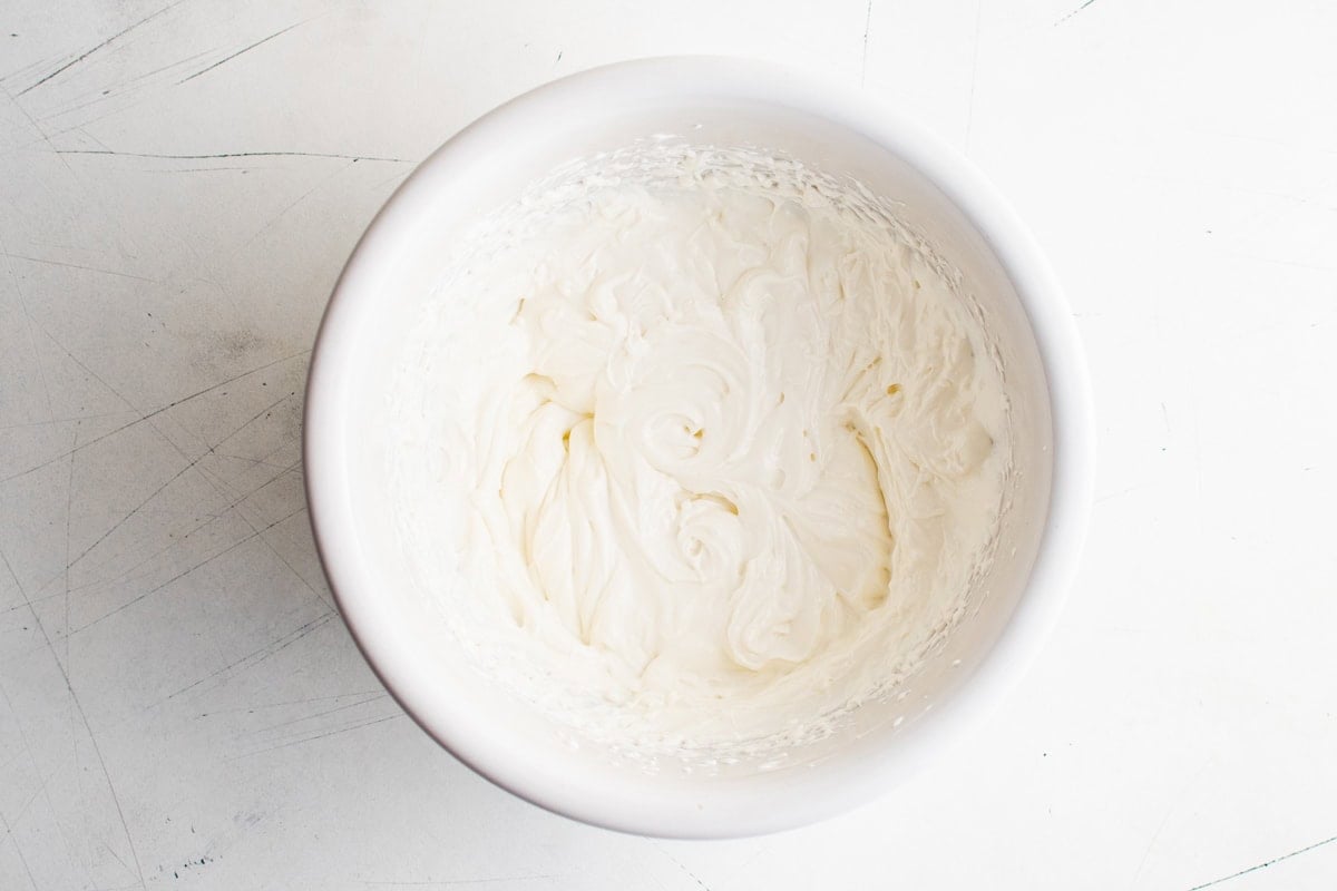 Creamy dip ingredients in a white bowl