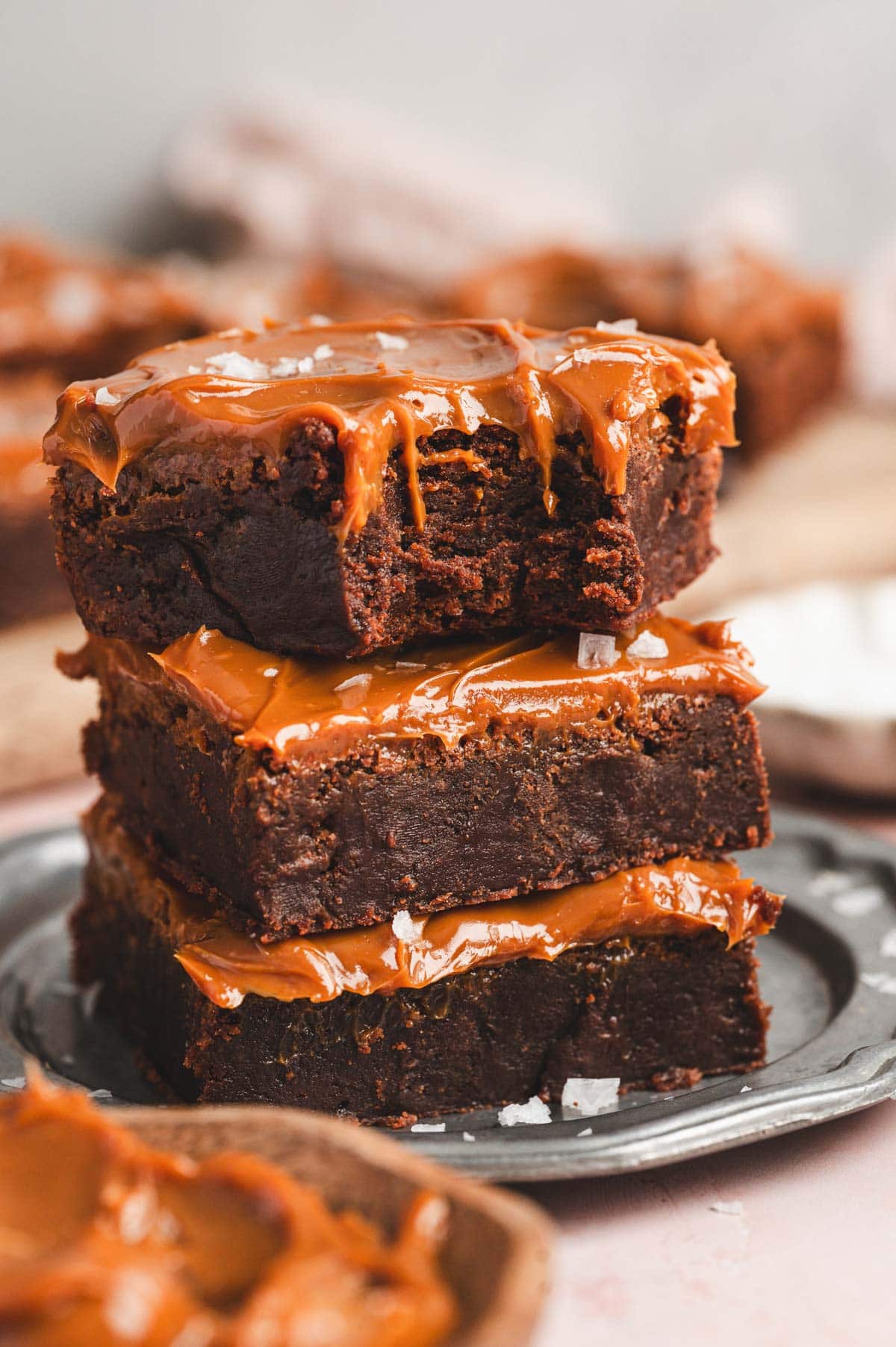 Stack of salted caramel brownies.