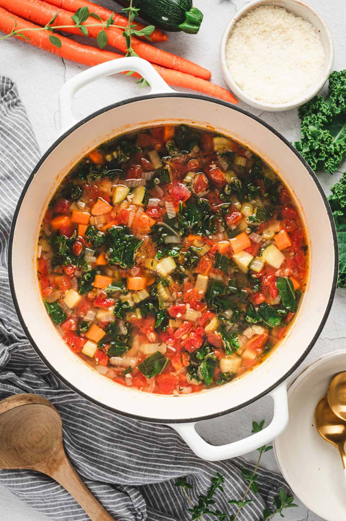 Veggie-loaded Tuscan Vegetable Soup in a white pot.
