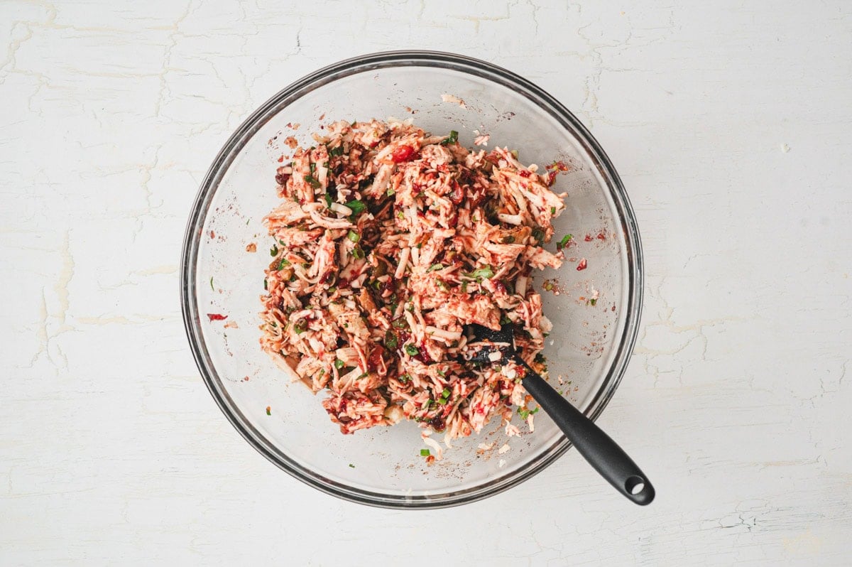 Enchilada filling in a glass bowl.