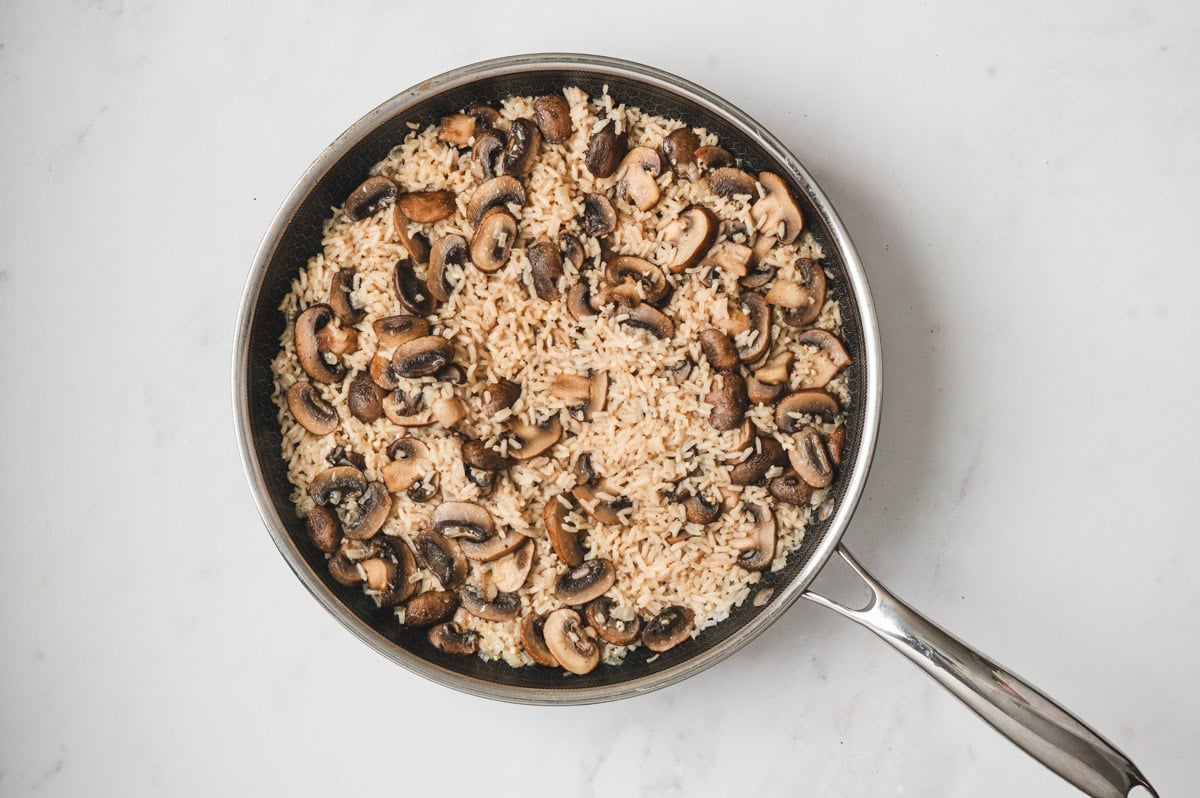 Mushroom rice in a skillet.