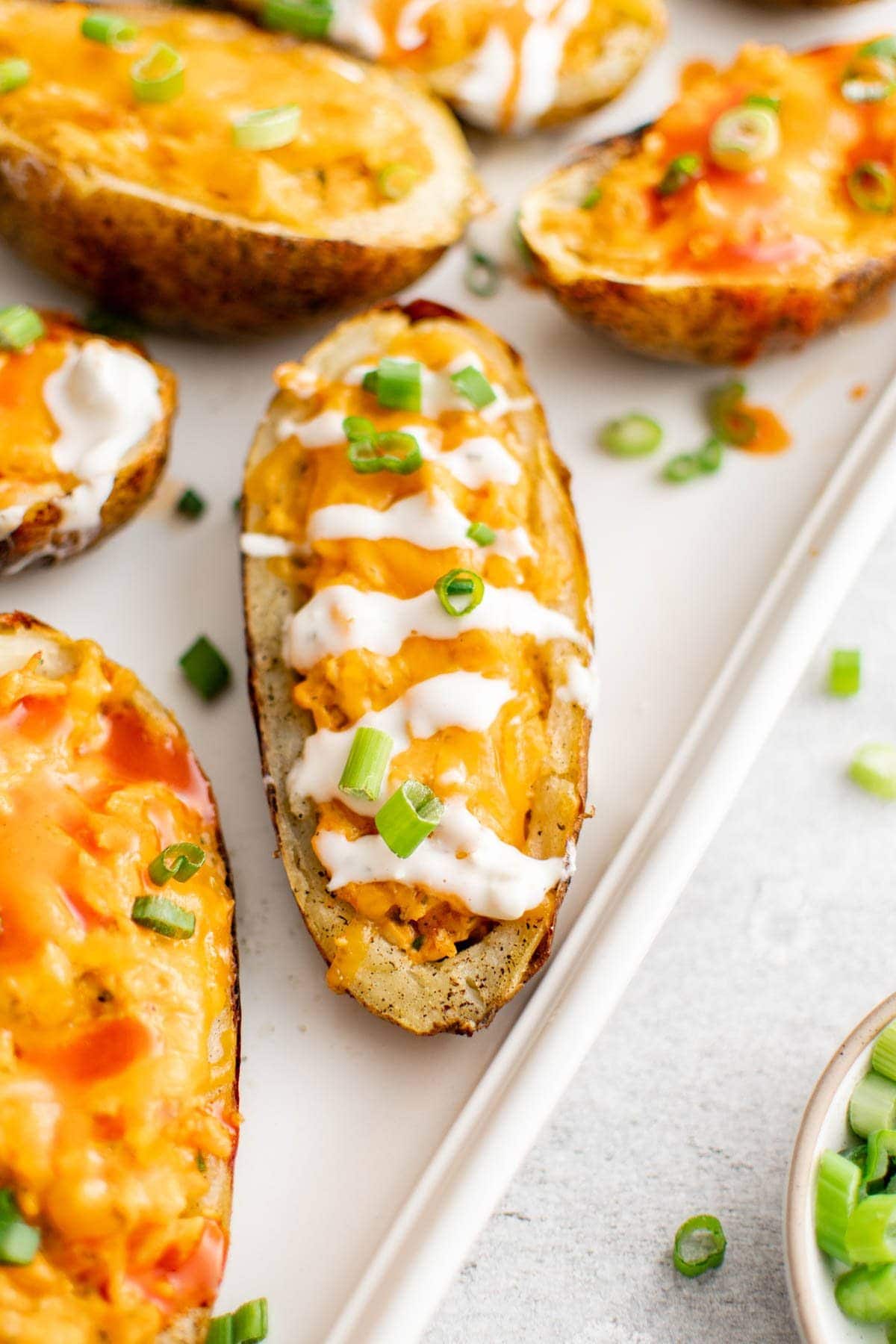 potato skins on a white platter