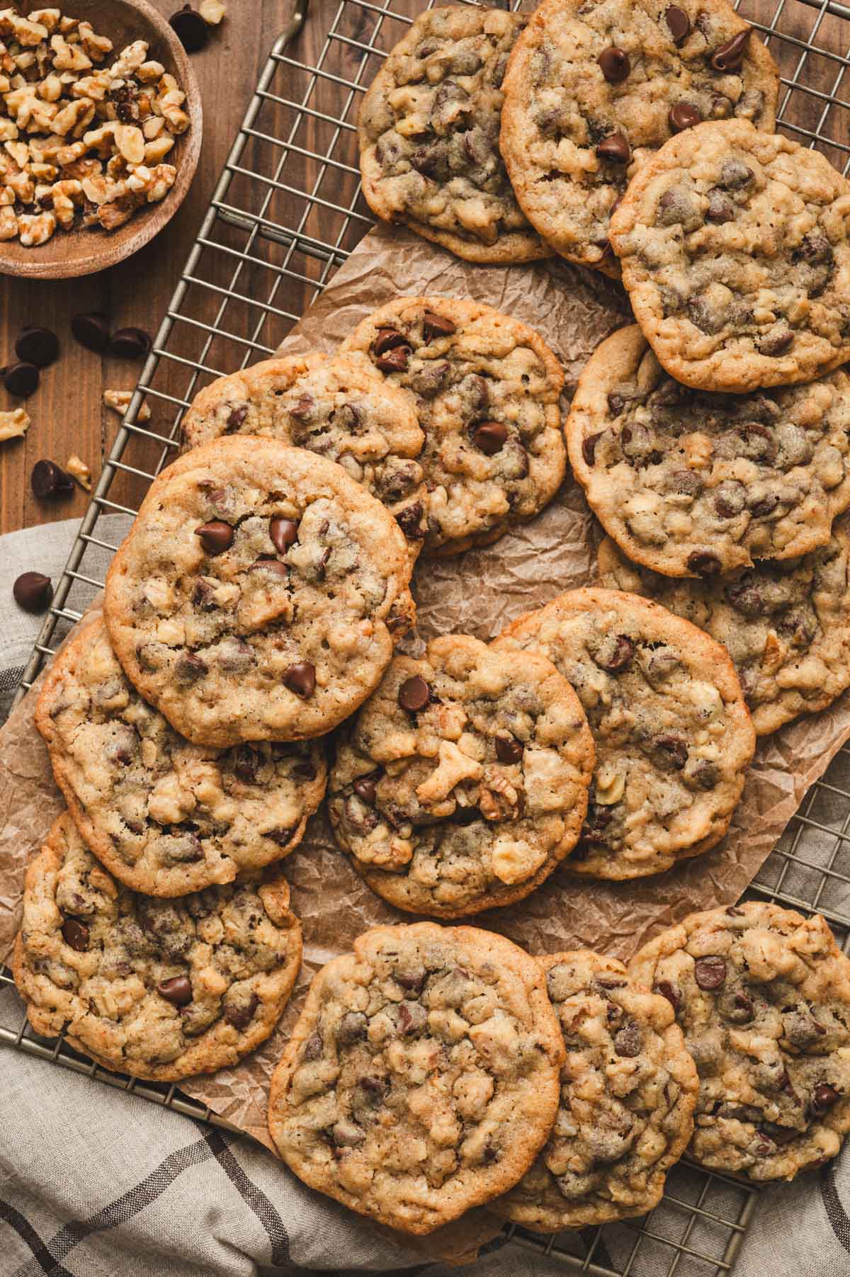 Chocolate Chip cookies with walnuts on a wire rack.