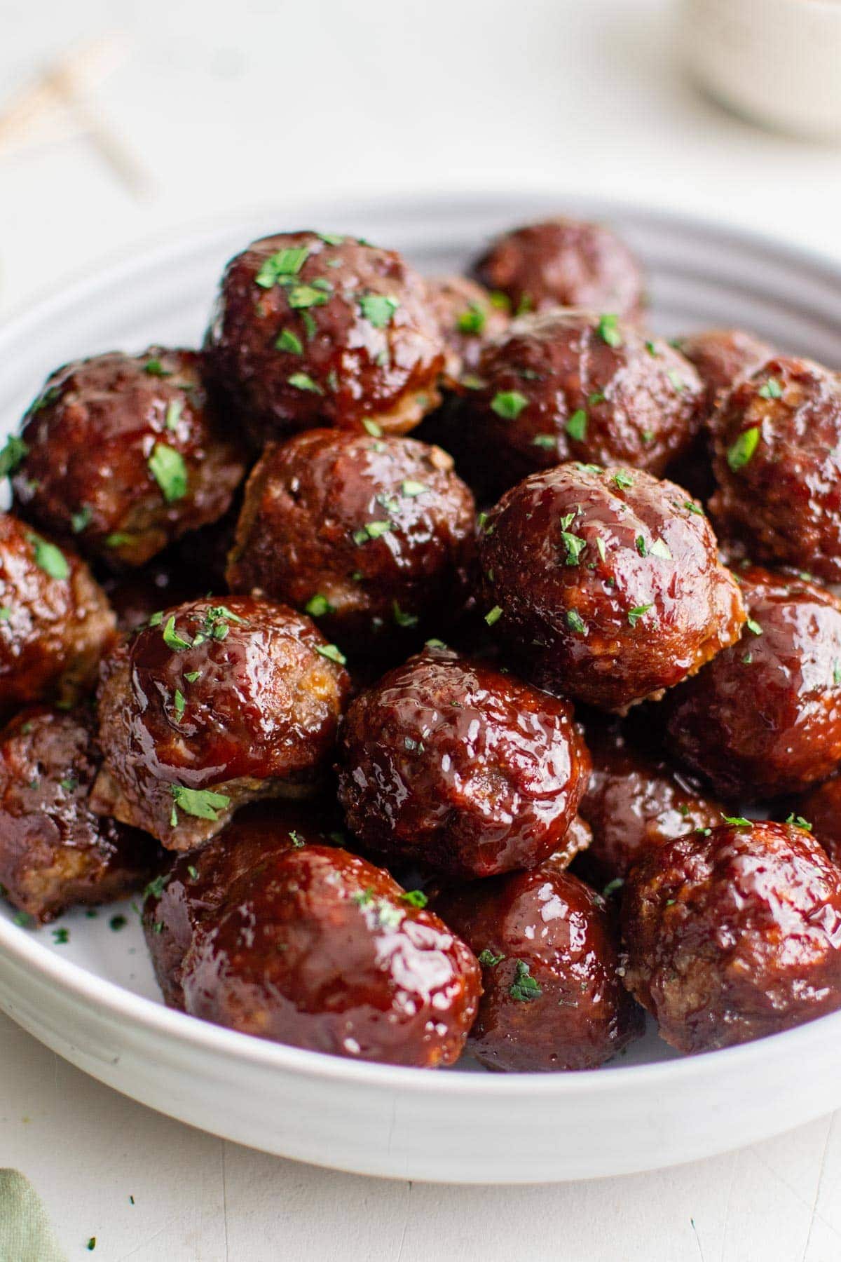 bbq meatballs on a white platter
