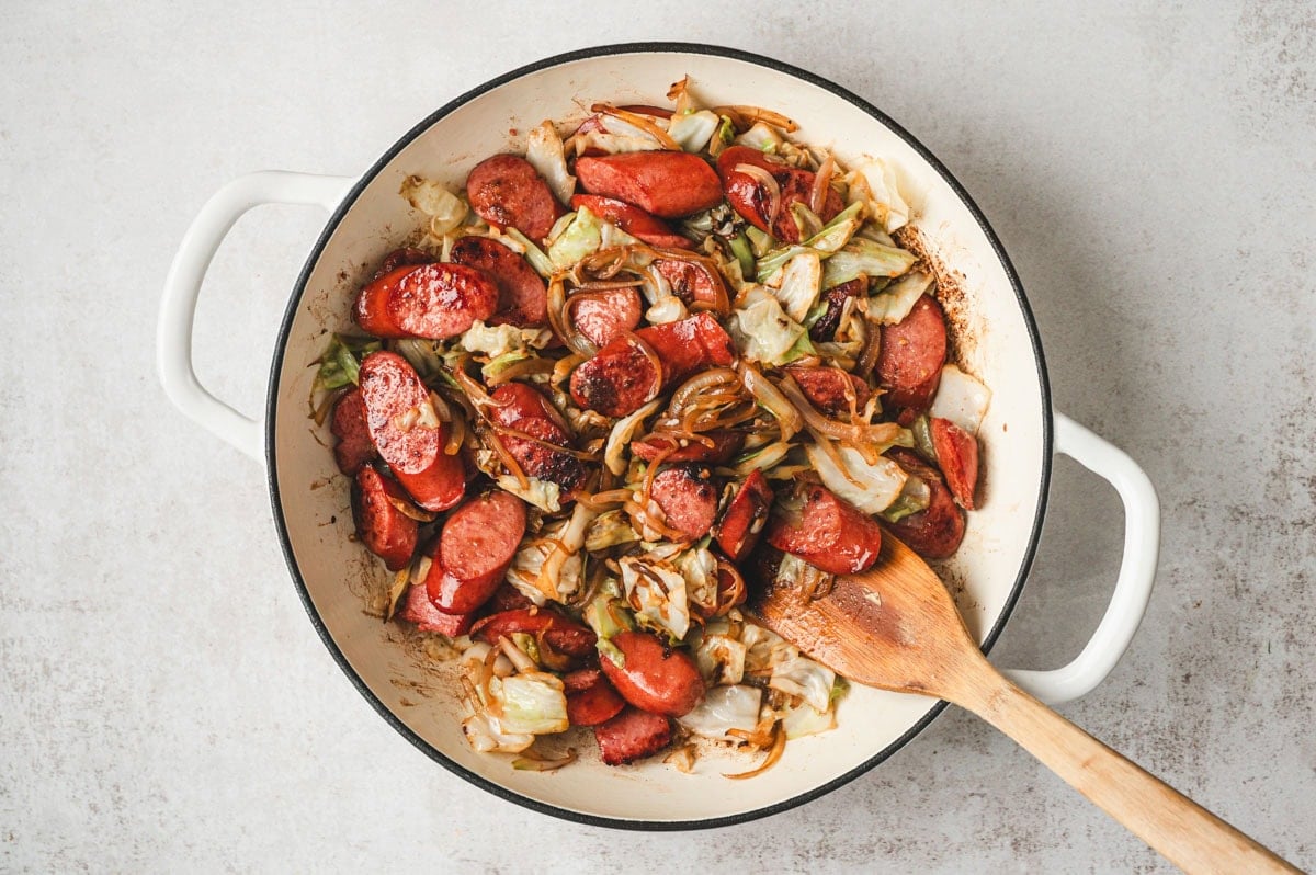 Kielbasa and cabbage with onions in a skillet