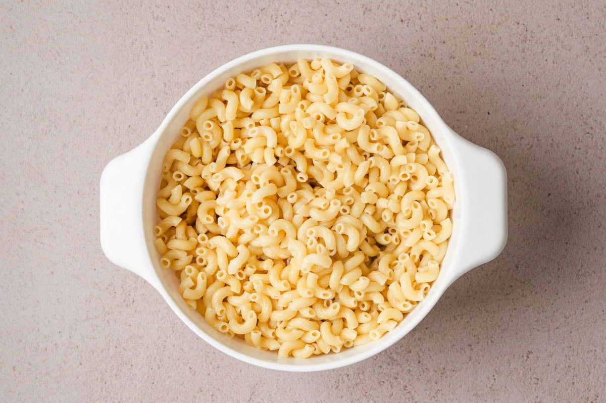 Cooked macaroni in a casserole dish.