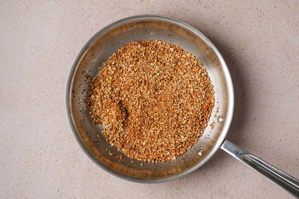 Toasted panko breadcrumbs in a skillet.