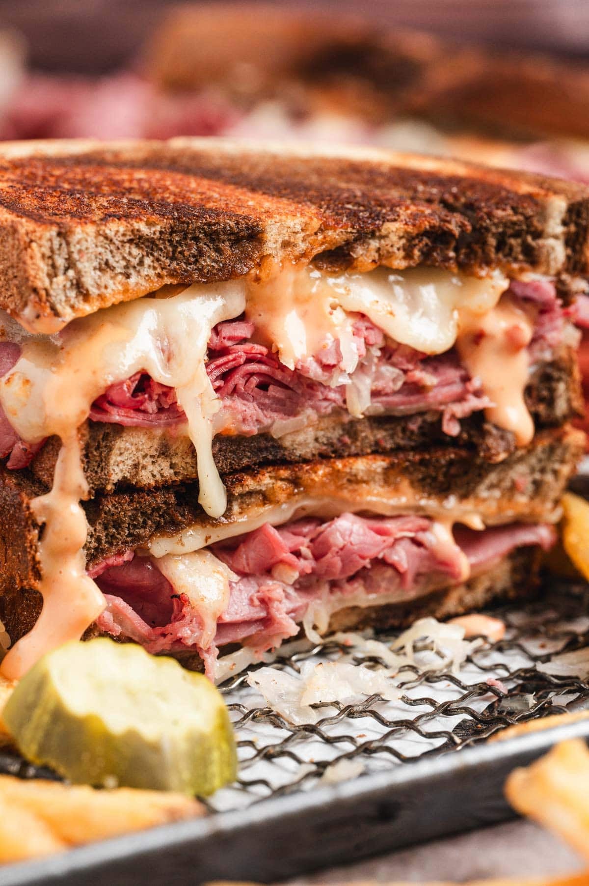 Close up of a Reuben sandwich cut in half