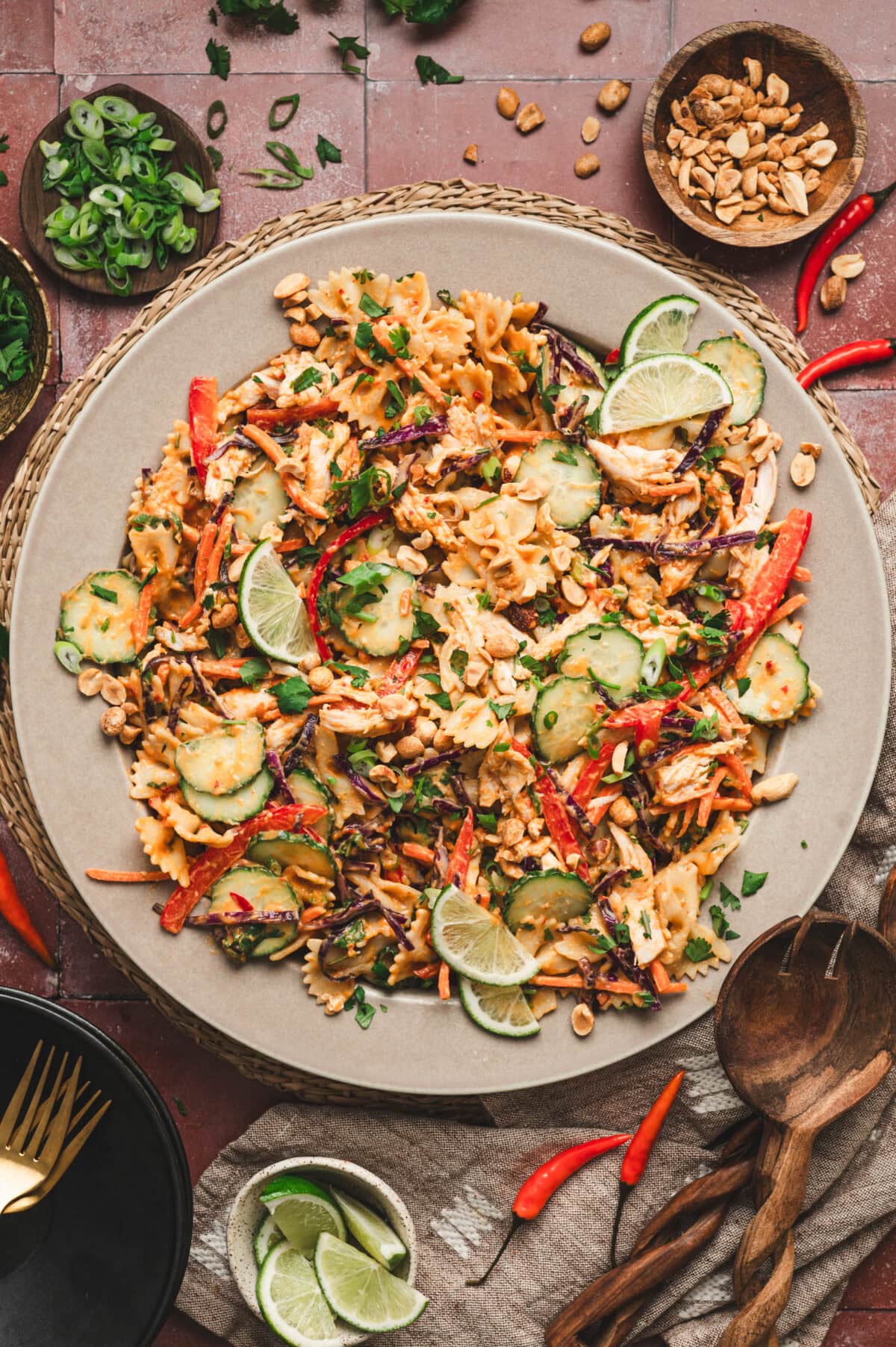 Thai chicken pasta salad on a gray serving platter.