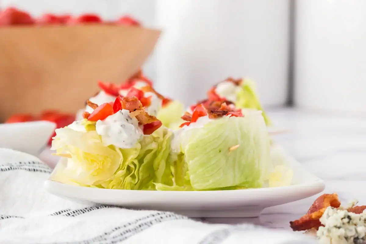 Wedge salad bites on a plate.
