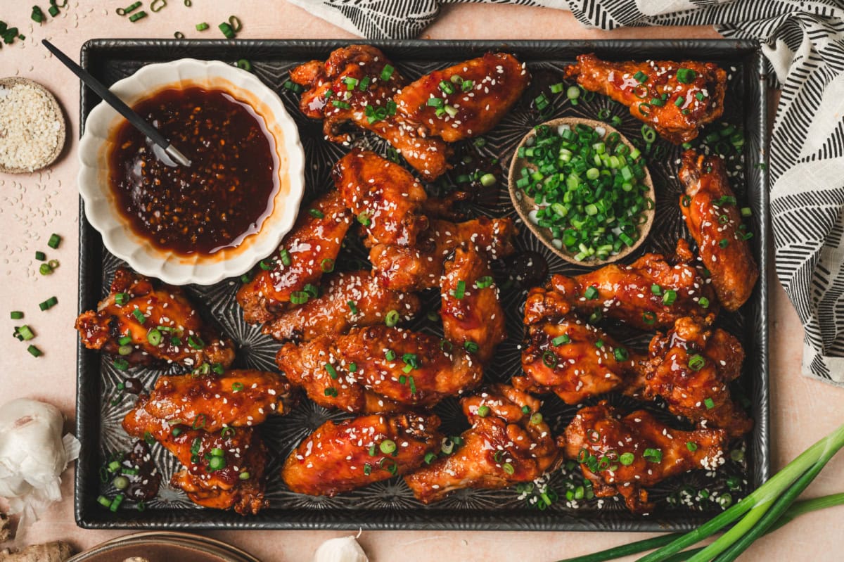 Honey garlic chicken wings on a platter