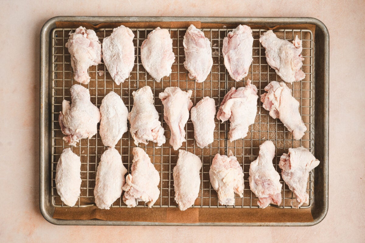 Seasoned wings on a wire rack
