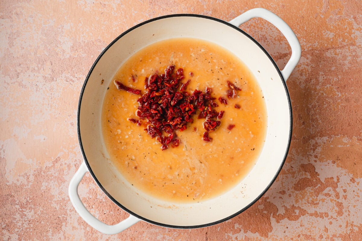 Sun-dried tomatoes plumping in chicken broth