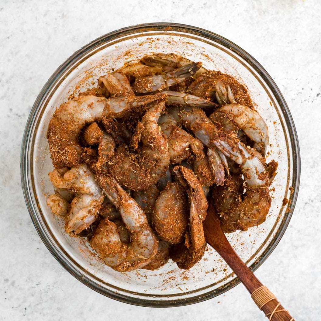 Raw shrimp tossed in blackened seasoning.