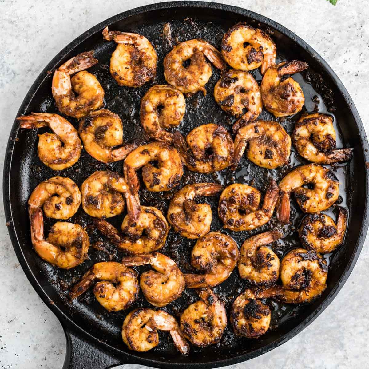 Blackened shrimp in a cast iron pan
