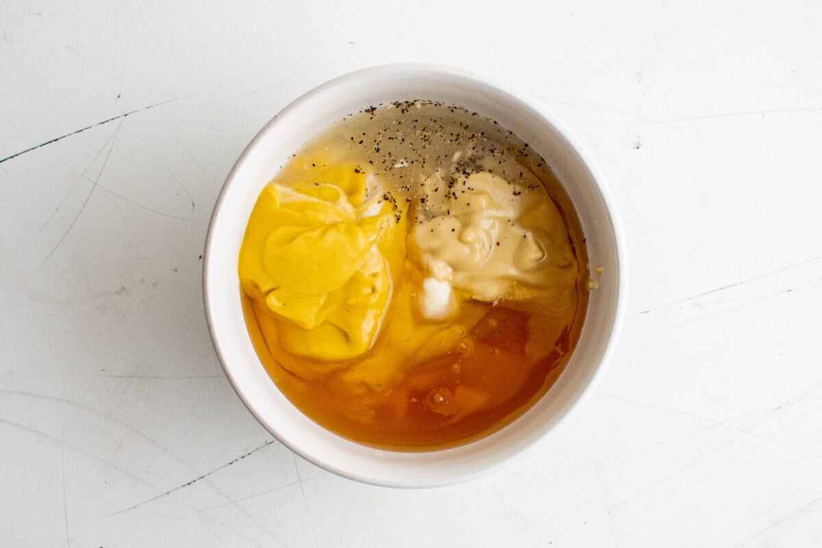 Honey mustard ingredients in a bowl