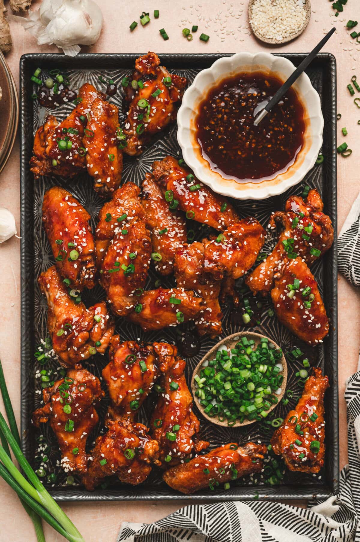 Honey garlic chicken wings on a platter
