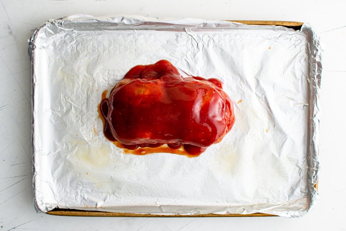 Glazed meatloaf on a sheet pan