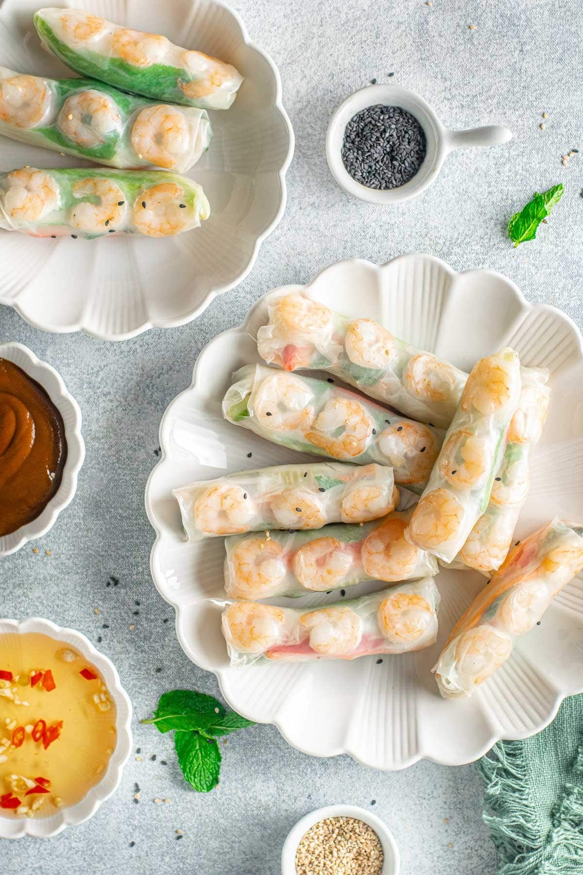 Shrimp spring rolls on a white platter