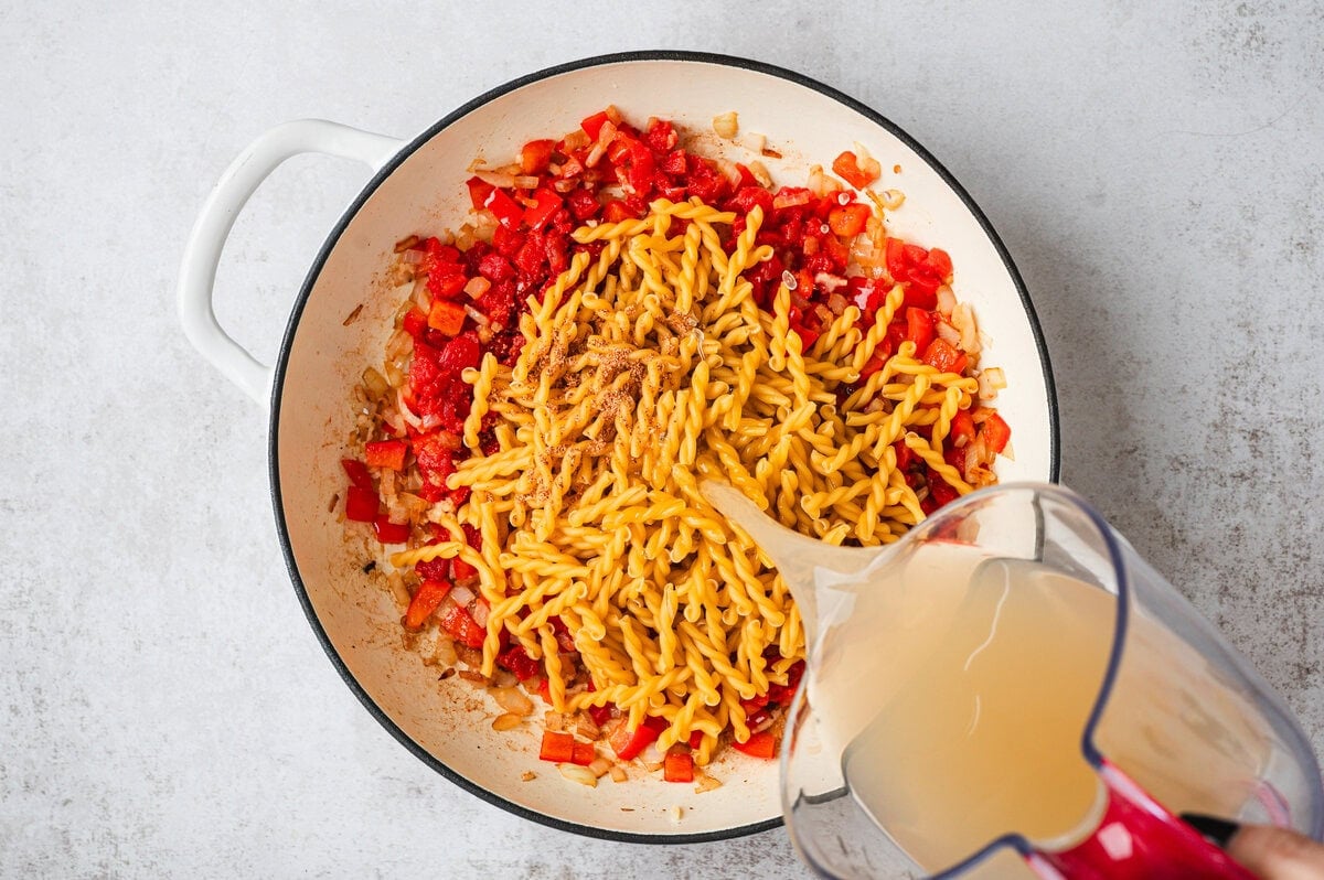Pasta and veggies in a white pan